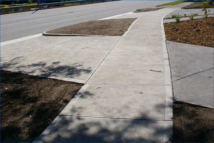 Concrete driveway and footpath photo commercial concreting with council approval.