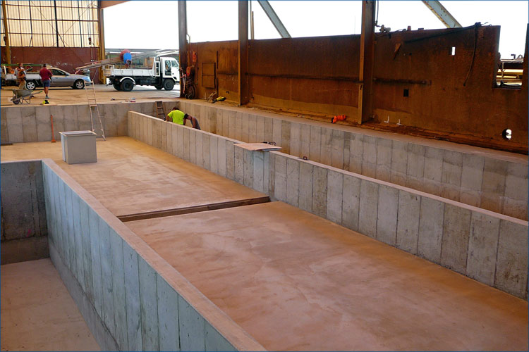 Commercial photo of concrete works including the laying of the main factory floor slab.